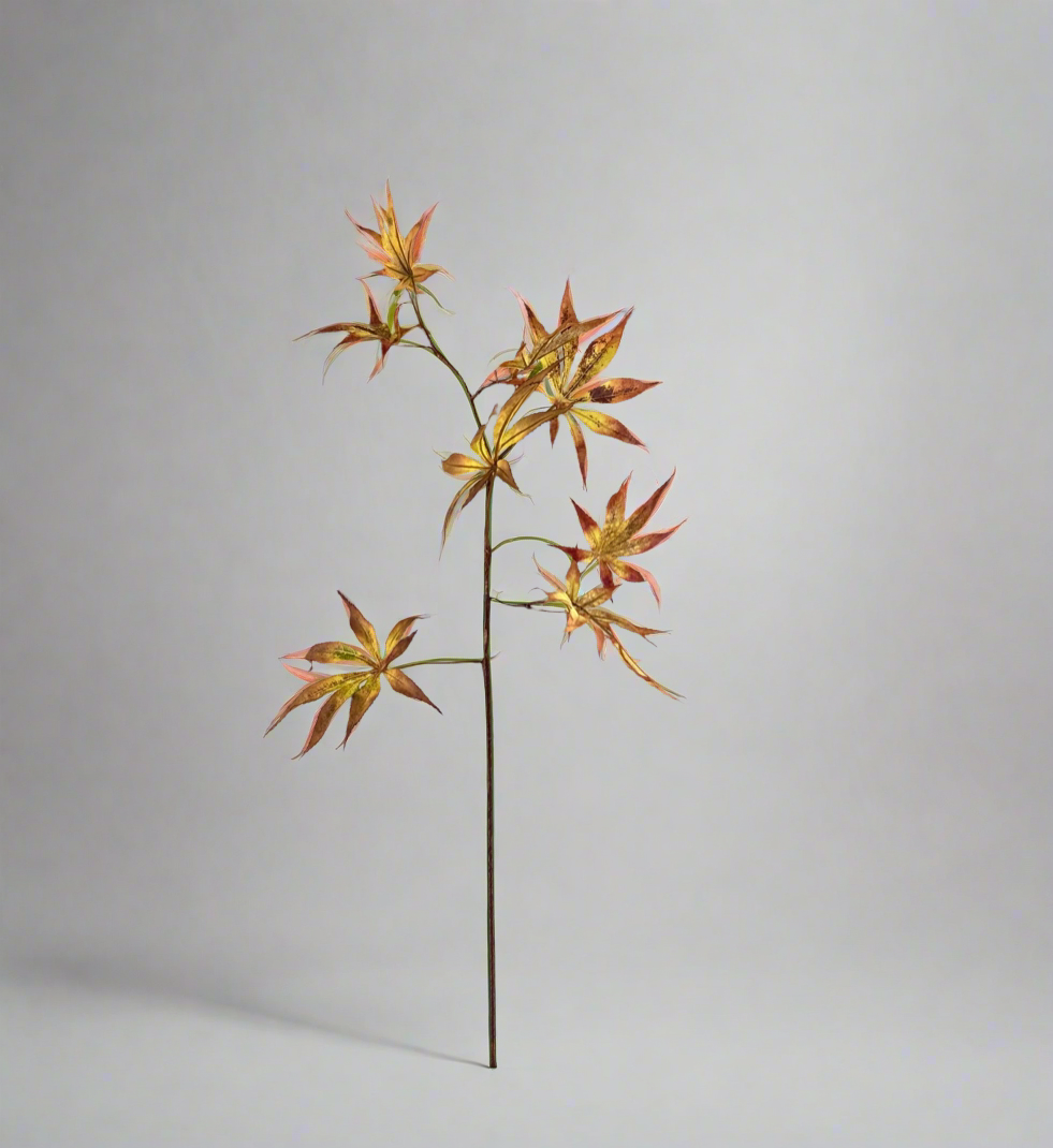 Single artificial Japanese maple leaf stem with warm autumn-toned foliage
