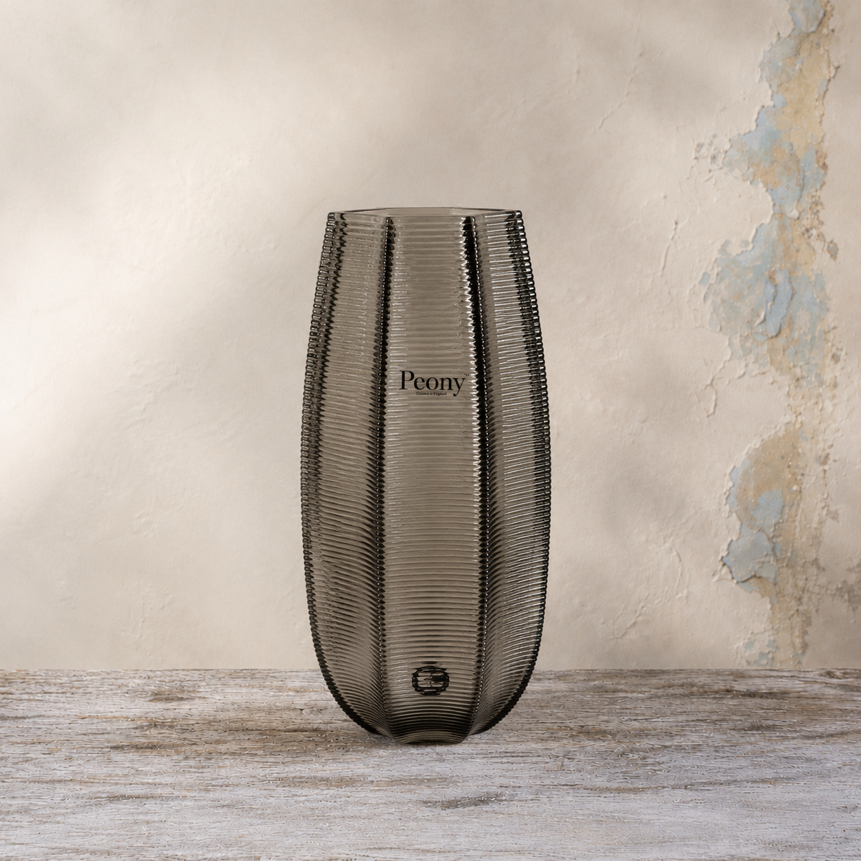 Medium smoked ridged glass vase with a tall curved silhouette.