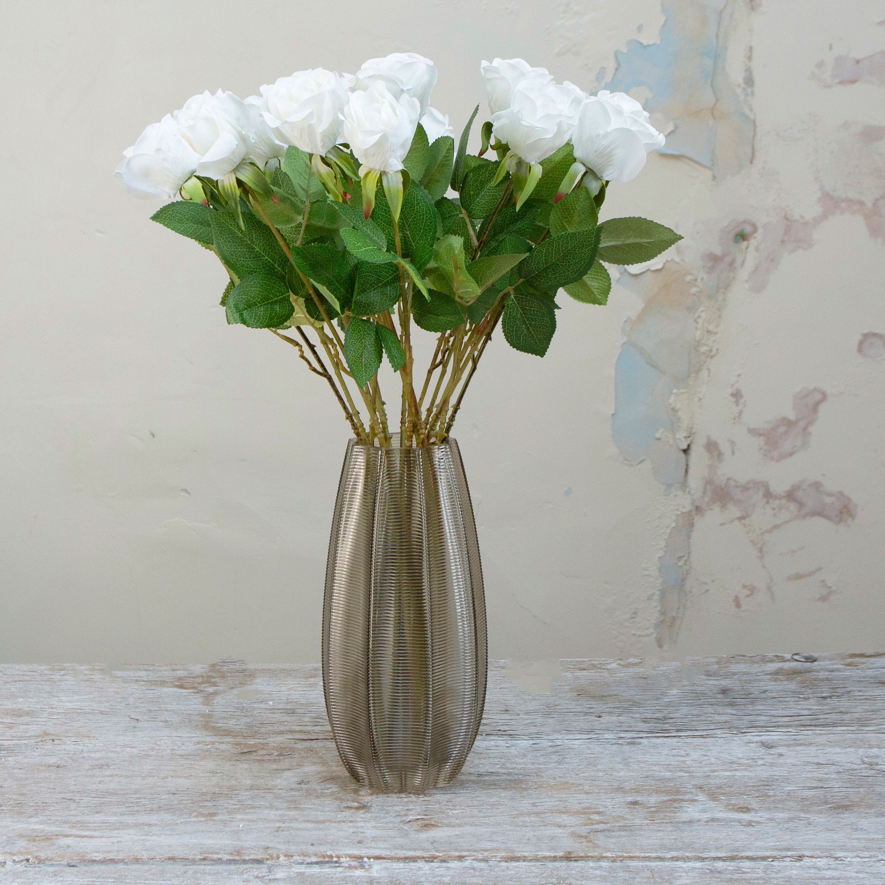 Artificial Apricot Real Touch Rose with Foliage on a Long Stem displayed in a glass vase