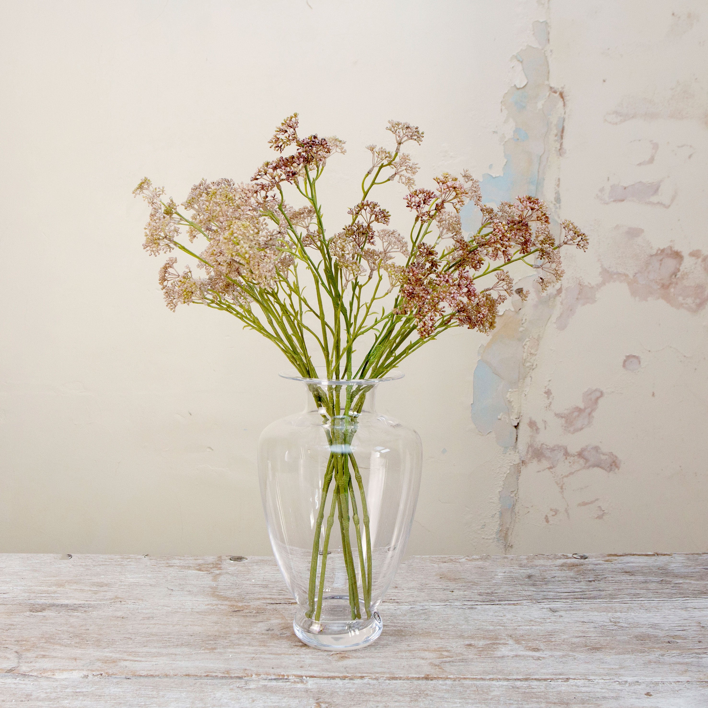 Artificial soft DUSKY MAUVE PINK patrinia spray stems displayed together in a vase for styling purposes