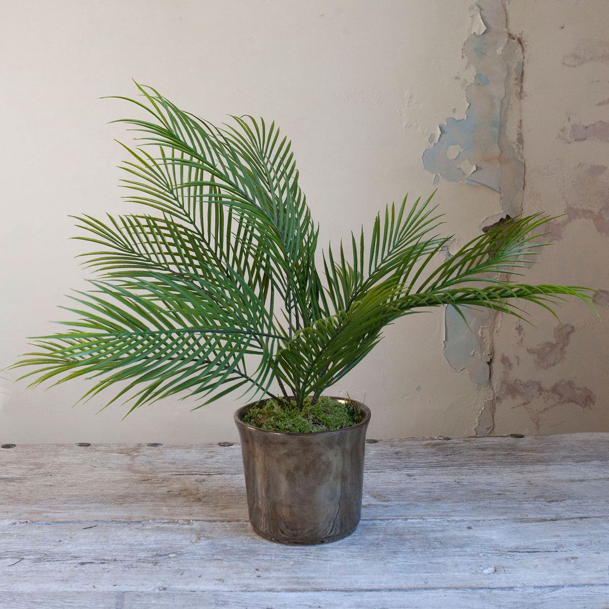 Artificial areca palm with realistic green fronds arranged in a gold ceramic pot.