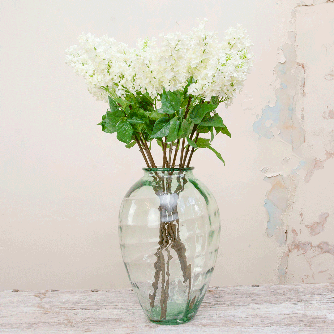 Bridal white lilac spray with green leaves Peony