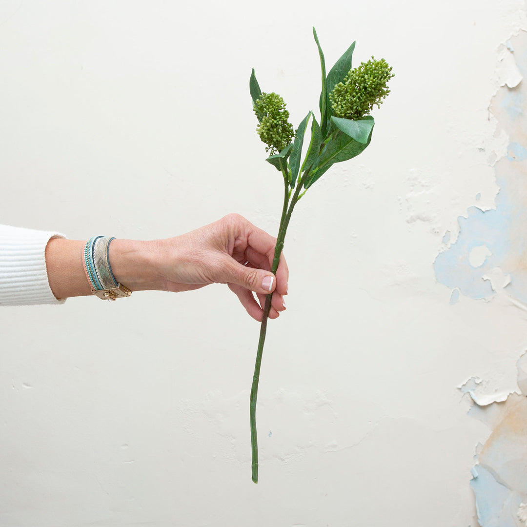 Real touch green skimmia berries.