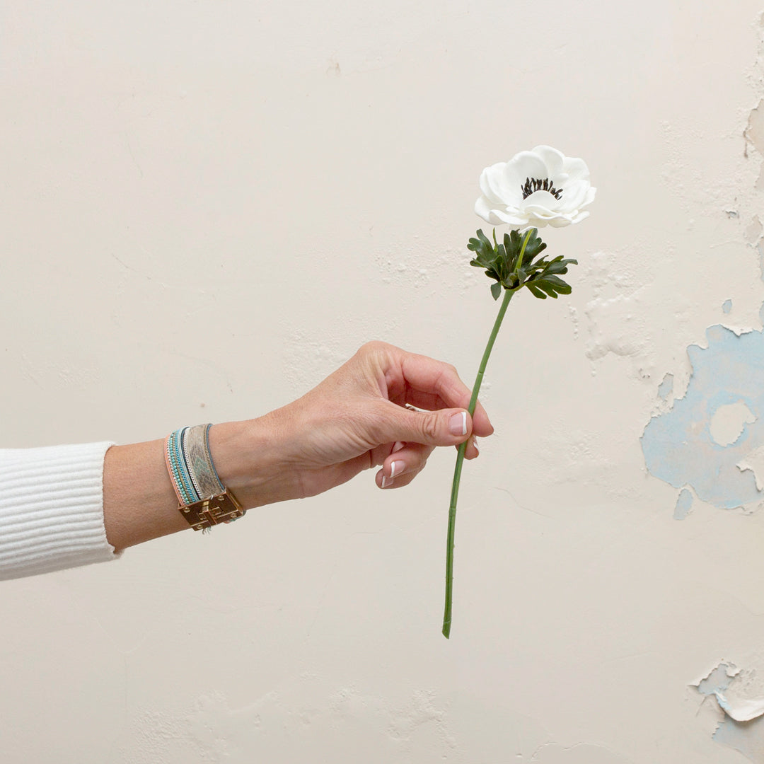 Real touch bridal white anenome with leaves.