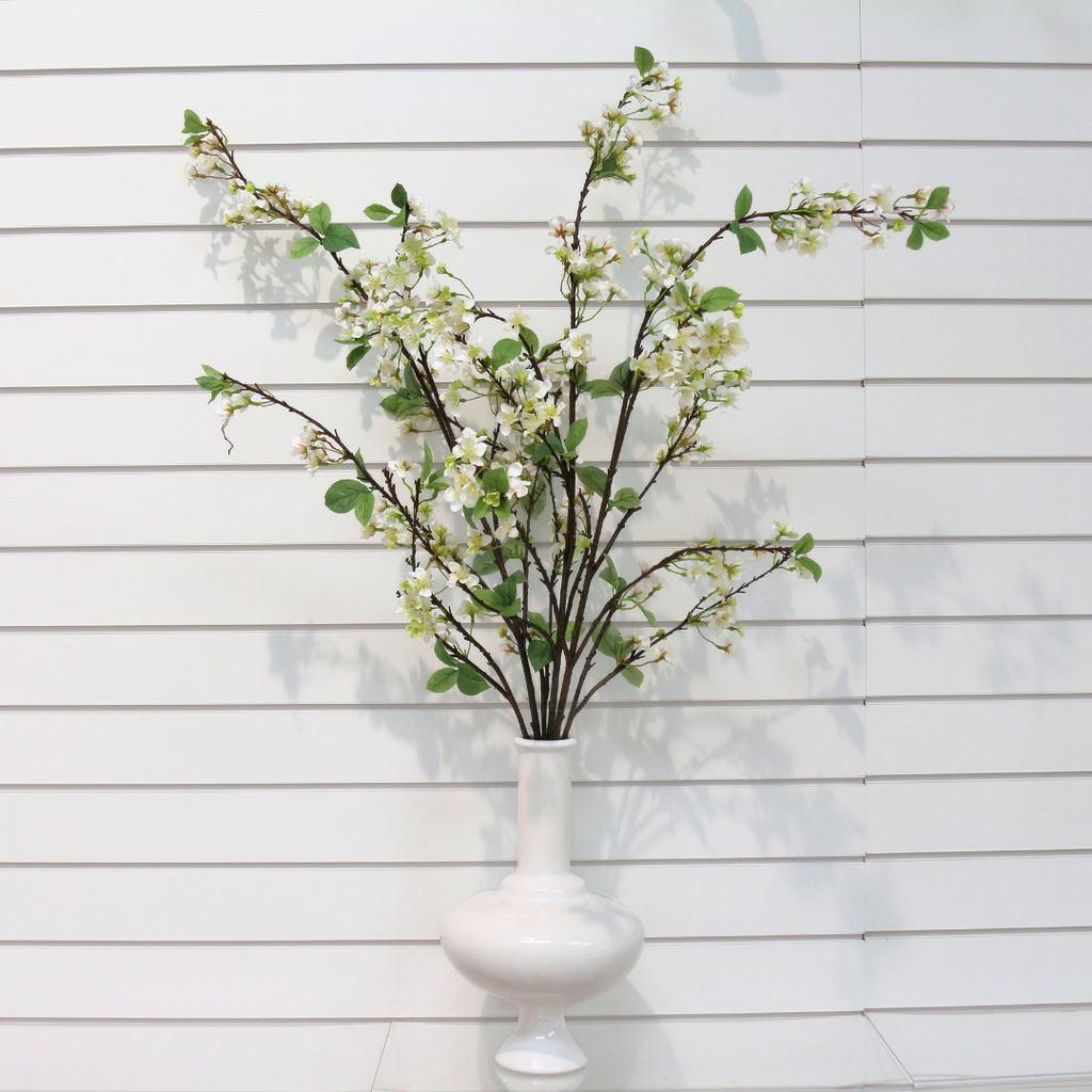 Beautiful Blossom Branches in a Unique Ceramic Tall White Vessel