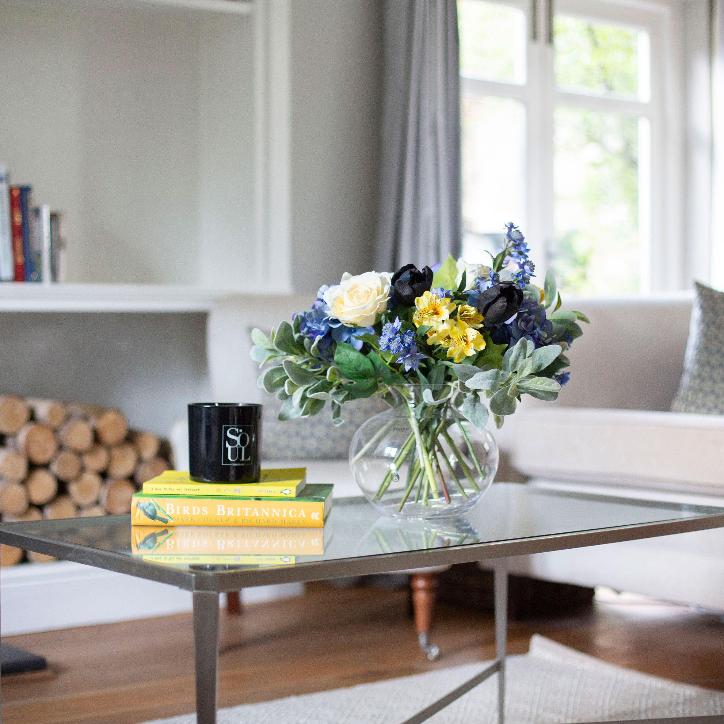 Artificial blue and yellow floral bowl arrangement with Roses, Hydrangeas and Tulips