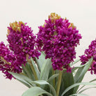Close-up of artificial purple hyacinth flowers showing clustered blooms and colour detail