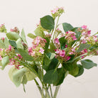Close-up of artificial pink viburnum flowers, highlighting soft pink buds, subtle tonal variation and detailed leaf texture.