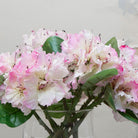 Close-up of artificial pink and white rhododendron flowers showing layered petals and gentle colour variation