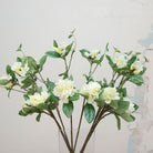 Close-up of artificial bridal white rhododendron flowers showing layered petals and soft colour detail.”