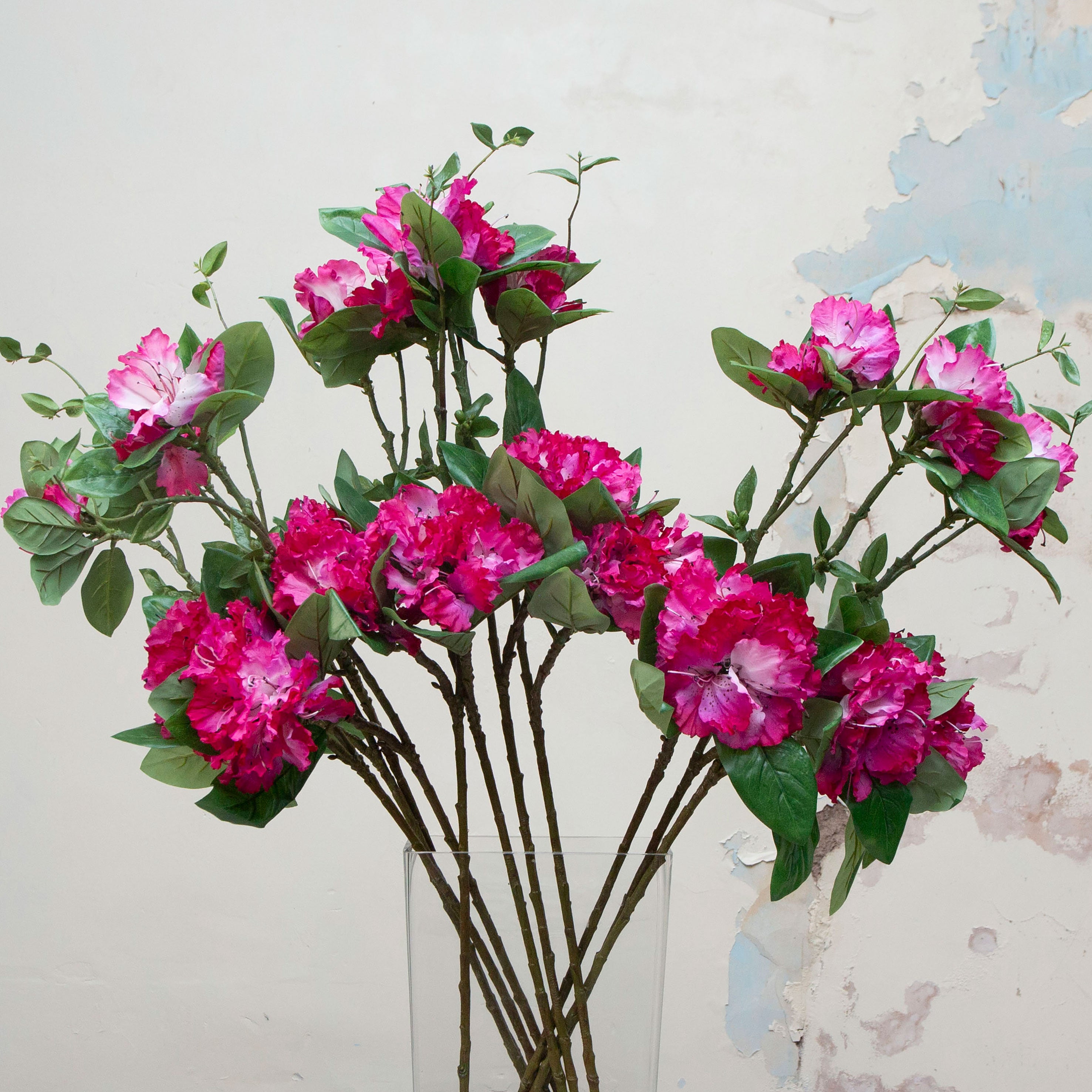 Close-up of artificial bridal white rhododendron flowers showing layered petals and soft colour detail