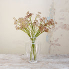 Artificial soft DUSKY MAUVE PINK patrinia spray stems displayed together in a vase for styling purposes