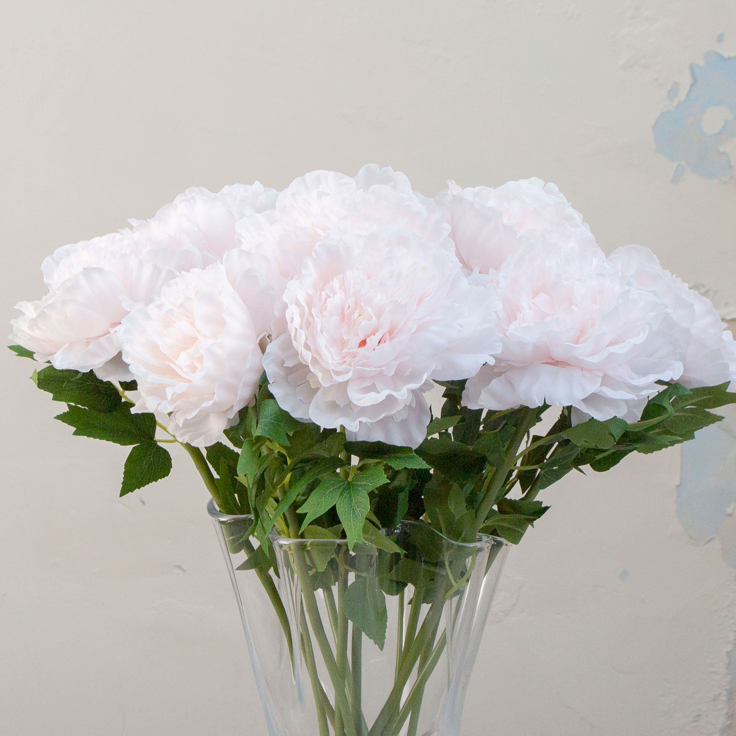 Close up of pale pink  artificial open head Peony Stem 