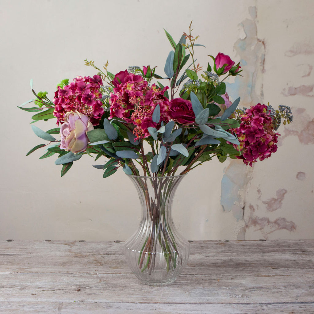 Magenta Roses, Hydrangea & Eucalyptus in a Grand Waisted Ridged Vase