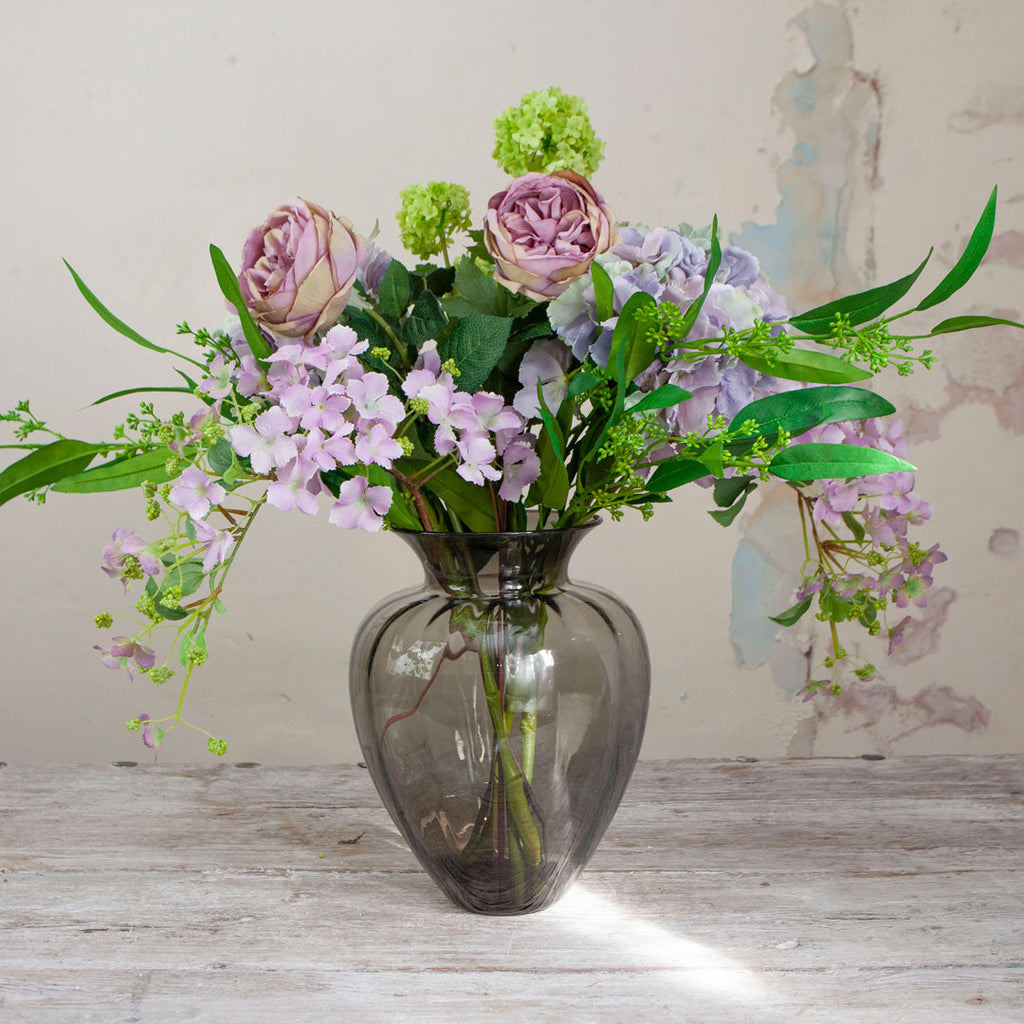 Roses, Hydrangea and Foliage in a Smoked Optic Vase