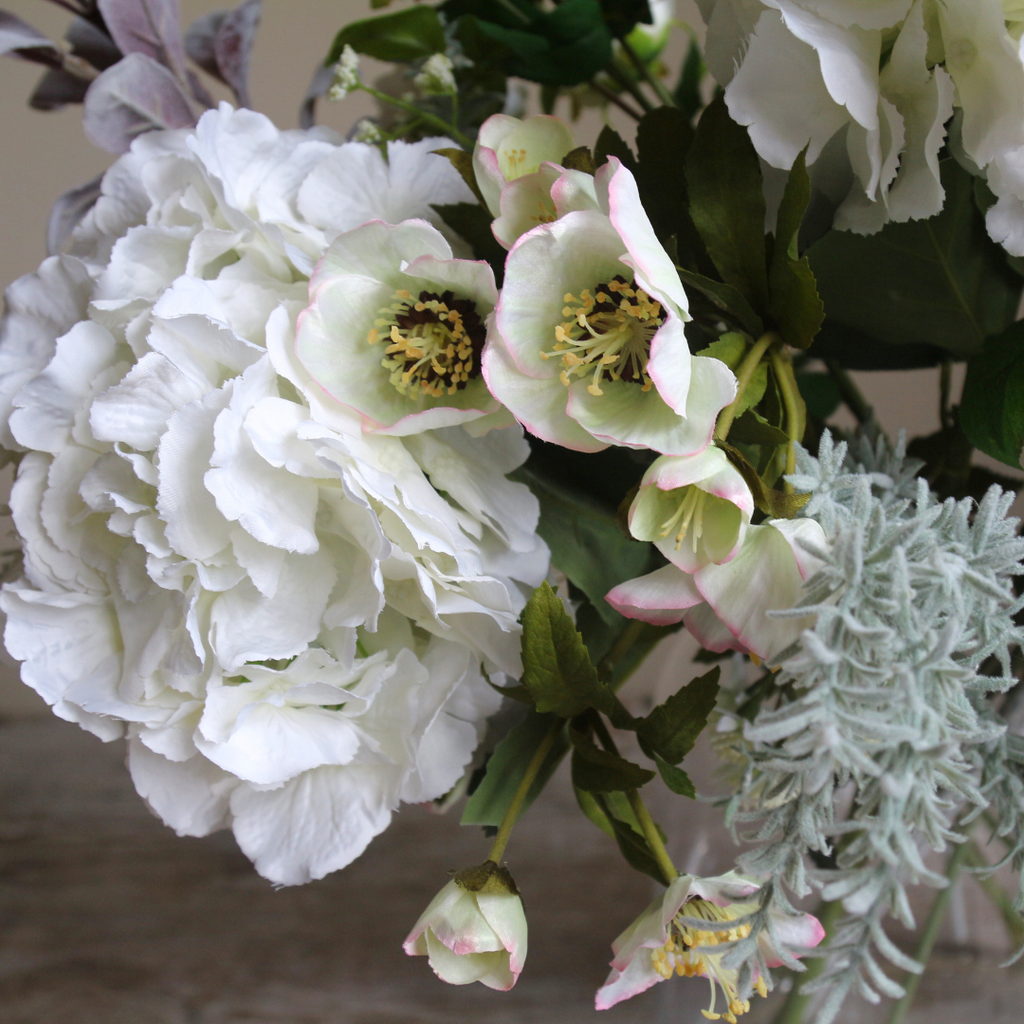 Hydrangeas, Hellebores, and Roses in a Large Chimney Vase