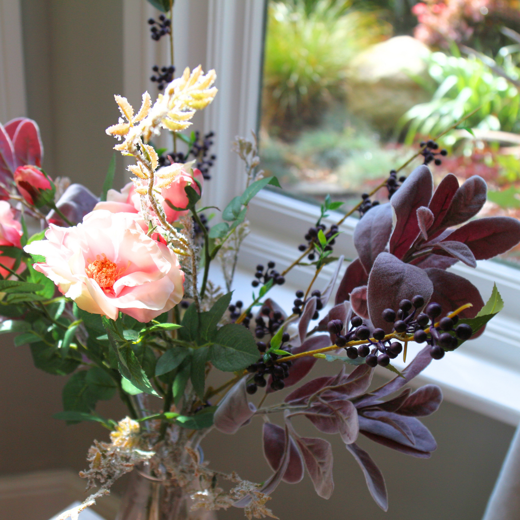 Pale Pink Dogwood Roses and Berries with Autumn Lambs Leaf in a Glass Vase Lifestyle Close up