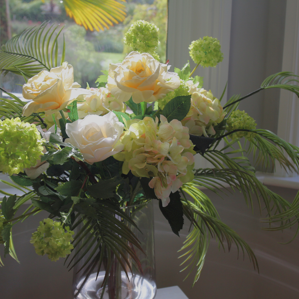 Real Touch Lemon Roses and Areca Palms with Hydrangeas in Footed Smoked Vessel Lifestyle close up