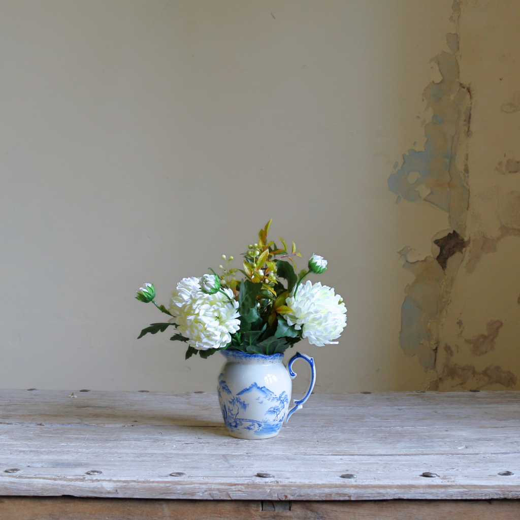 Blue and White Jug with Bridal White Chrysanthemums, Snowberries and Foliage 