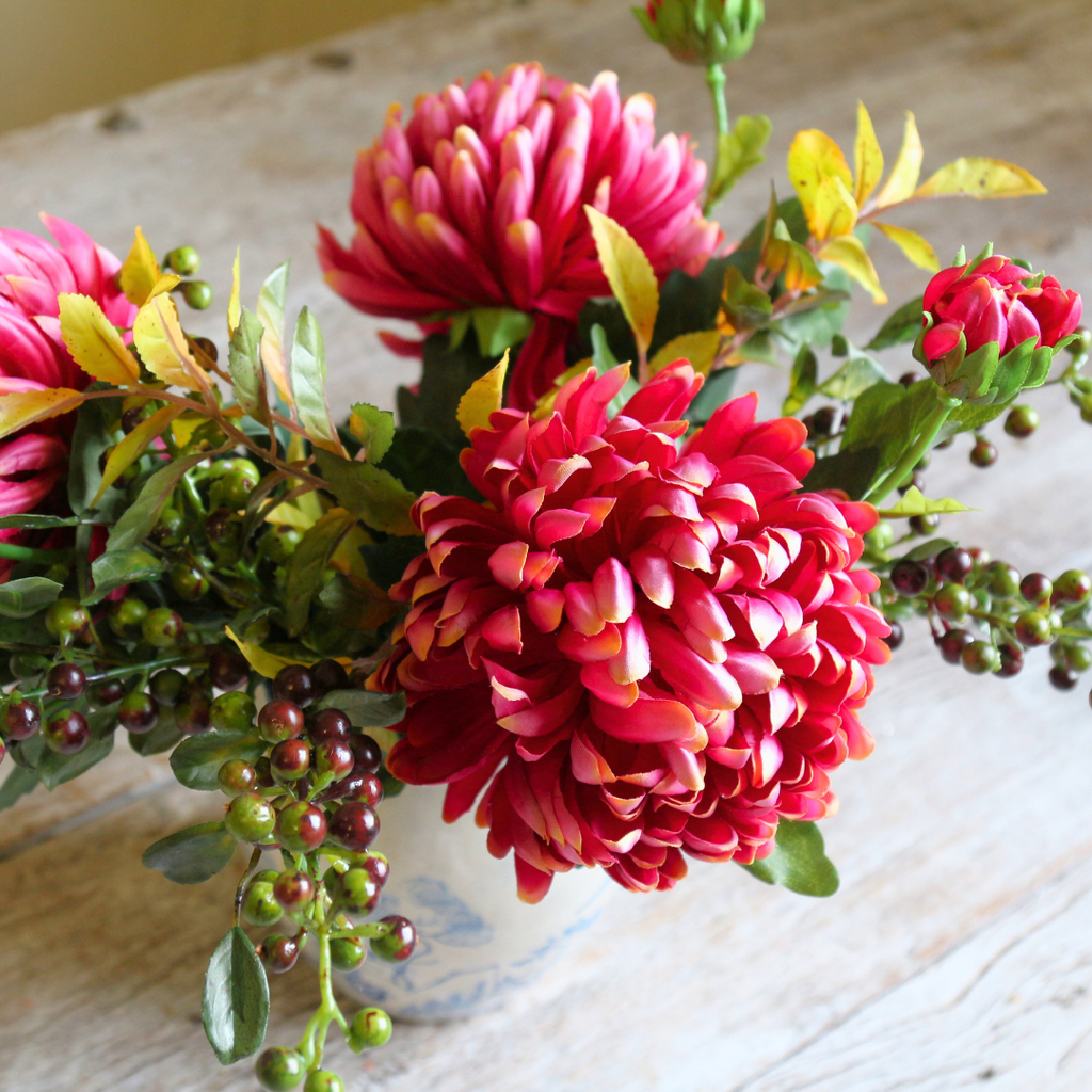 Blue and White Jug with Fushia Chrysanthemums, Berries and Foliage Close up