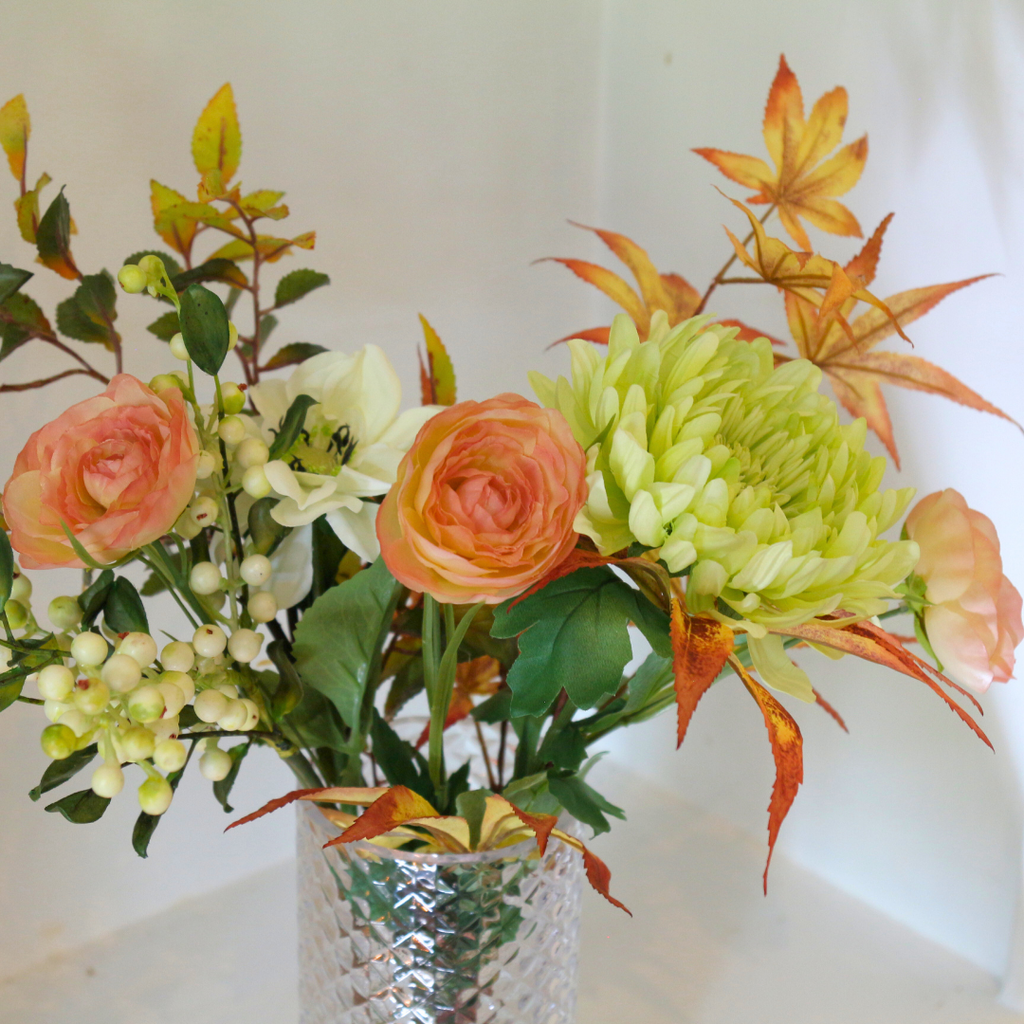 Autumn Mix of Flowers and Foliage in a Pretty Textured Glass Vase Lifestyle Close up 
