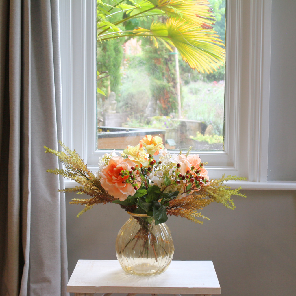 Autumn Mix with Roses, Berries and Hydrangeas in a Amber Pumpkin Vase Lifestyle