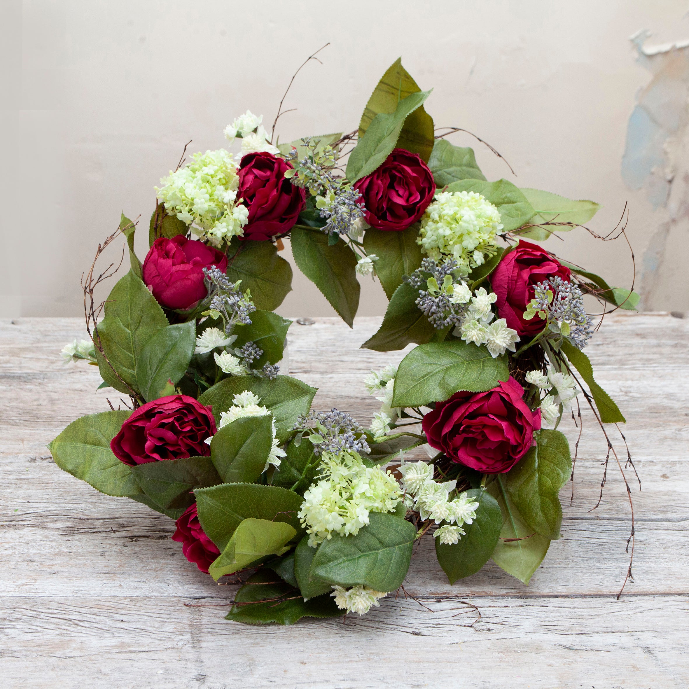 Artificial peony summer wreath with full peony blooms, suitable for front doors or interior wall display
