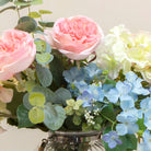 Artificial Country cottage style roses and hydrangea arrangement in a glass rope lantern vase