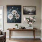 Artificial cosmos flower arrangement featuring soft pink blooms with eucalyptus and flocked greenery, displayed in a medium rope lantern vase