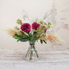 Purple Dhalias with Astilbe and Foliage in a Glass Vase Peony
