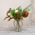 Orange Chrysanthemums and Foliage in a Large Rope Lantern Vase Peony