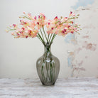 Real touch phalenopsis with buds on a long stem. Peony