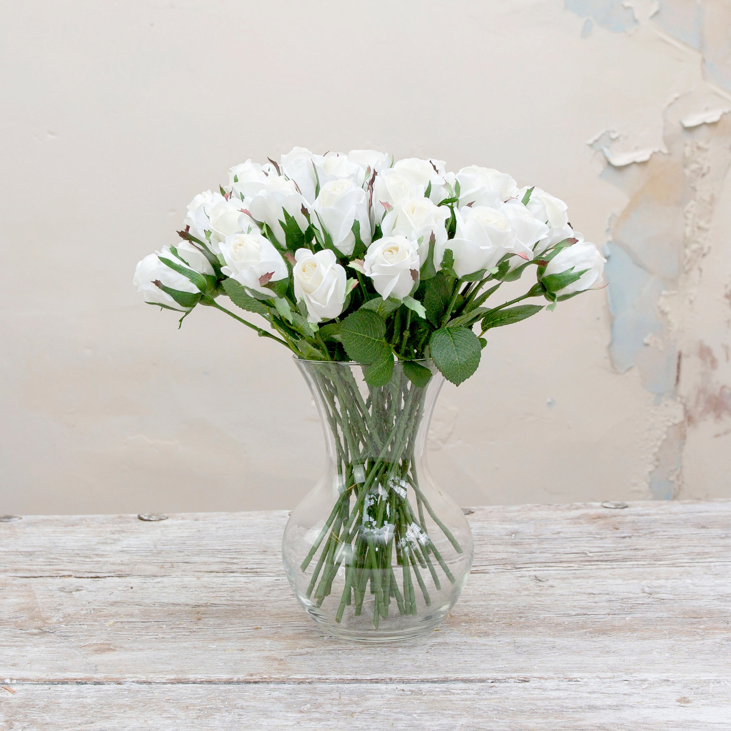 Real touch rose bud in bridal white. Peony