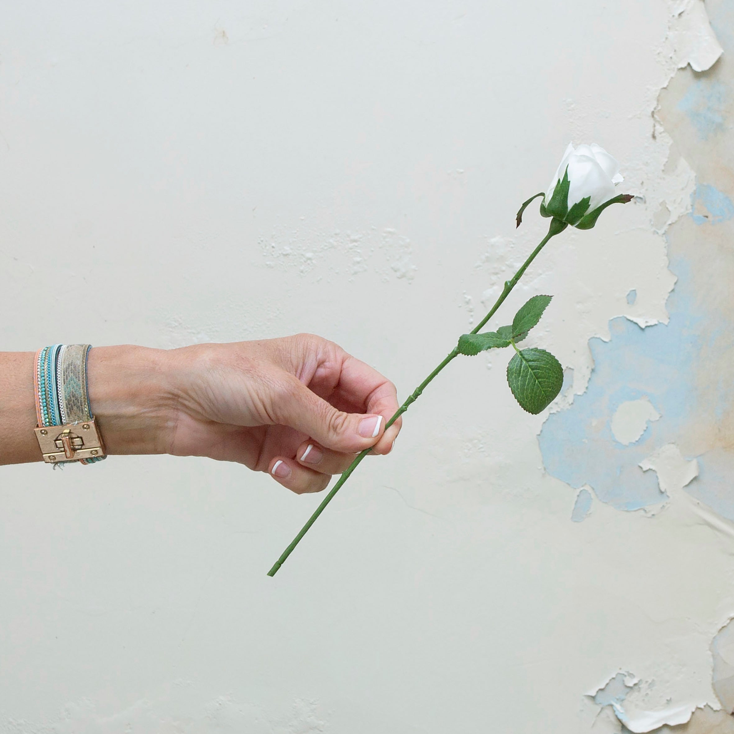 Real touch rose bud in bridal white. Peony