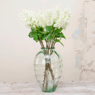 Bridal white lilac spray with green leaves Peony