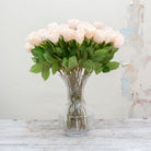 Artificial Apricot Real Touch Rose with Foliage on a Long Stem in a glass vase
